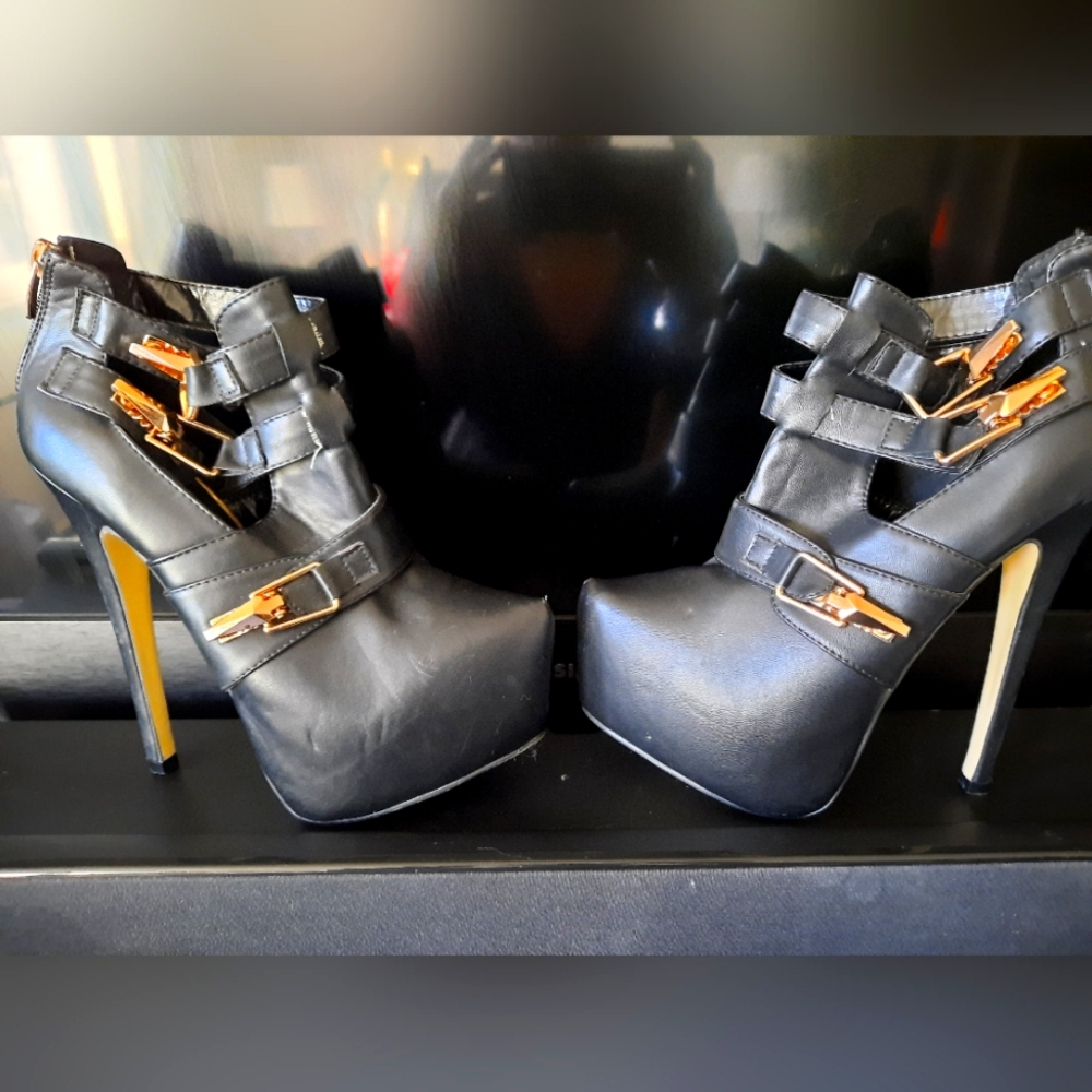 Black Stiletto Ankle Boot w/gold buckles
